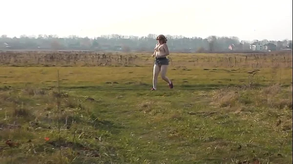 Naked in public. Nude in public. Outdoors without panties and bra Sexy MILF Frina play Sport at stadium outside. Public. No panties. Naturist. Outdoor. Nudist